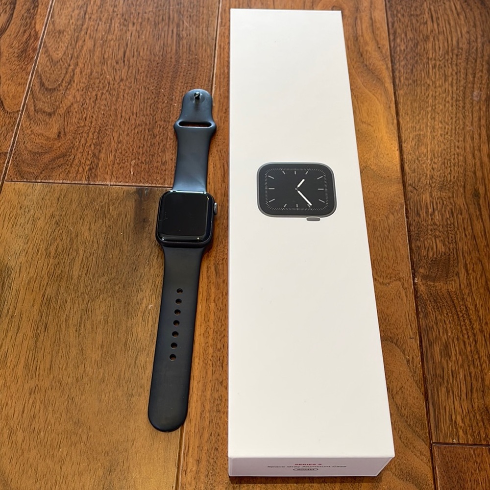 BRAND NEW Apple Watch. Lightly worn, perfect condition, comes in original box.